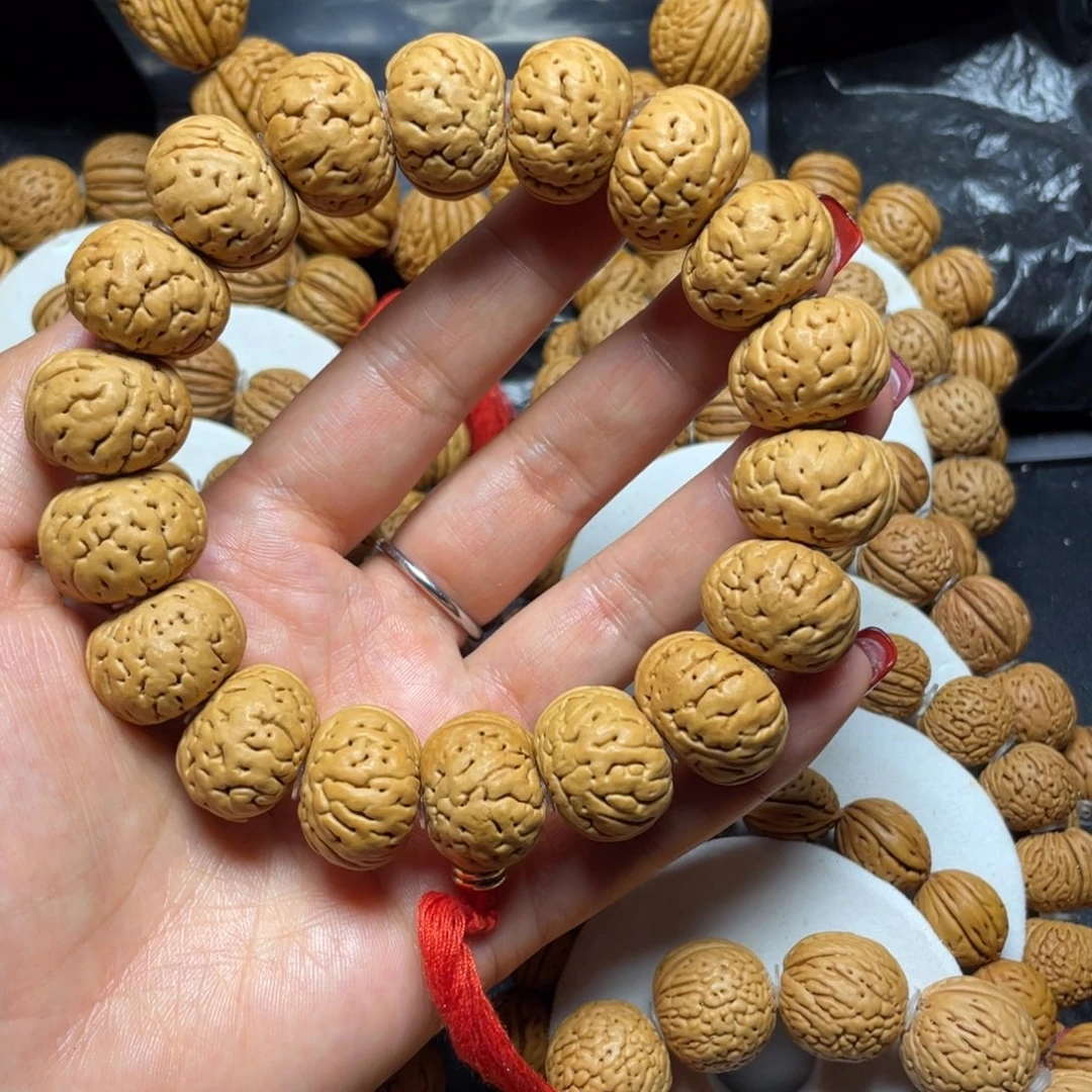 吊坠桃核桃核手串20+钮扣