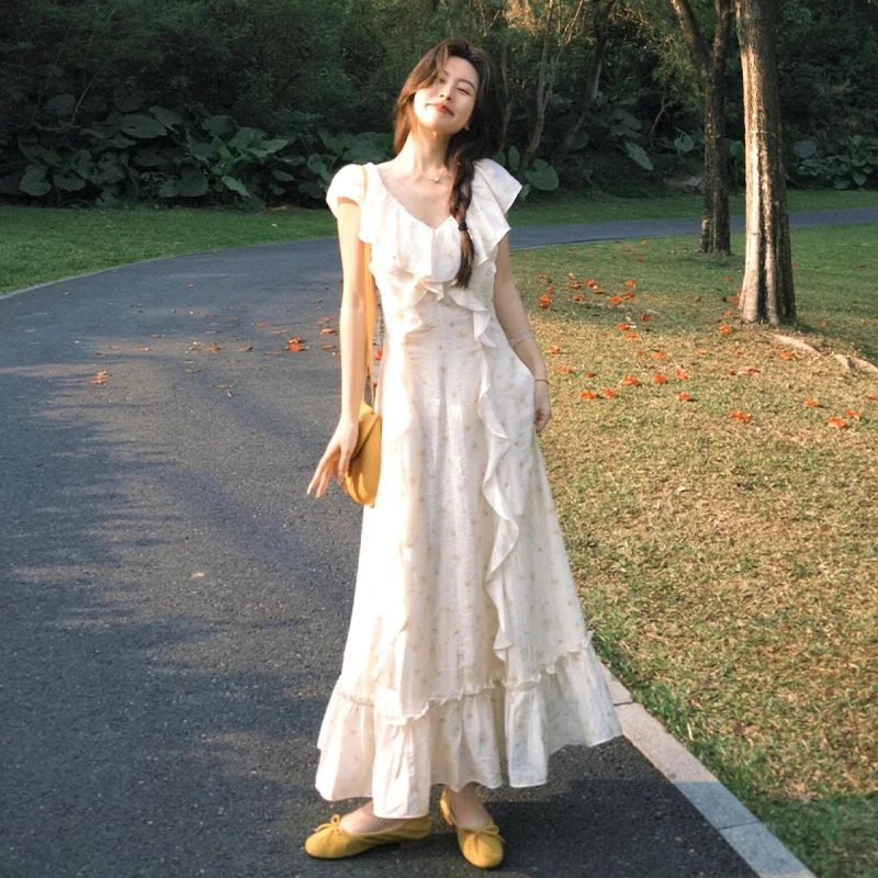 2025新款荷叶边v领黄色碎花连衣裙子女夏季温柔气质收腰长裙3364