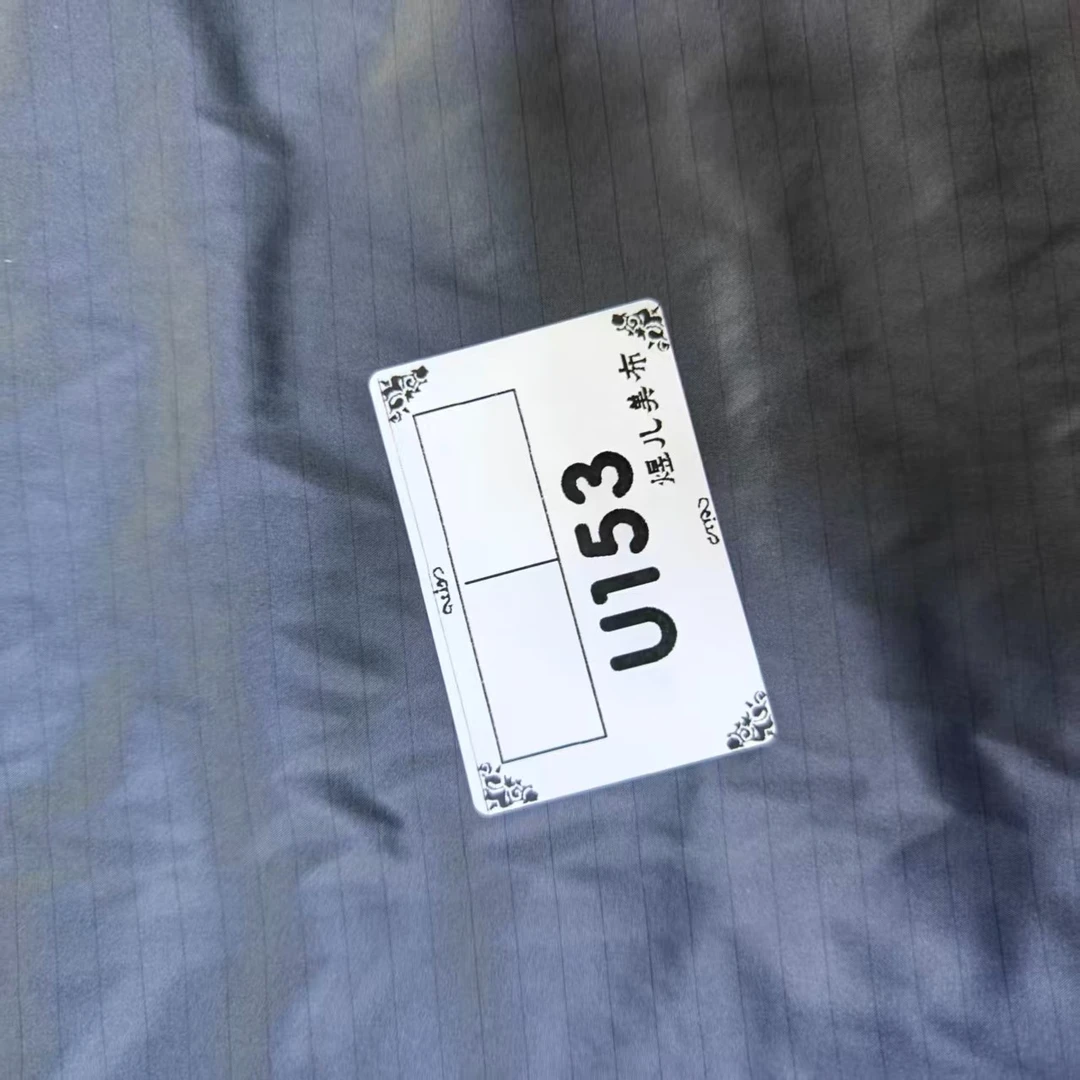 153珠光灰羽绒服通道布料