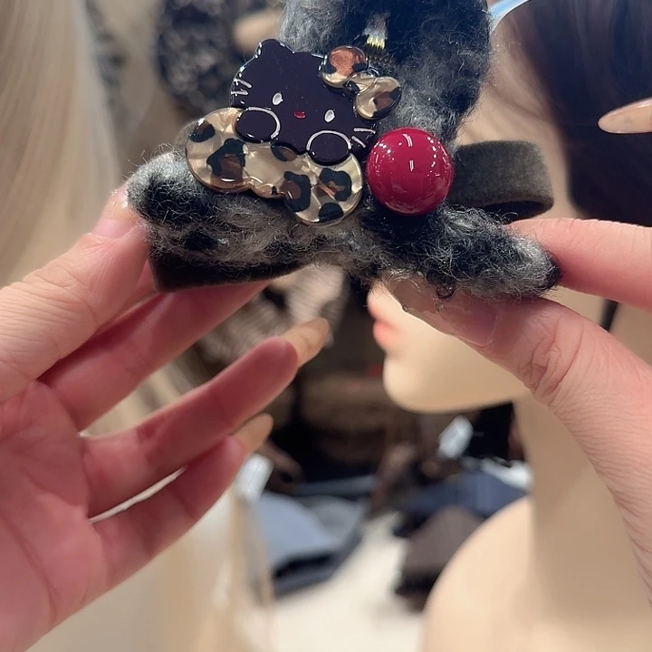 豹纹kt抓夹蝴蝶结