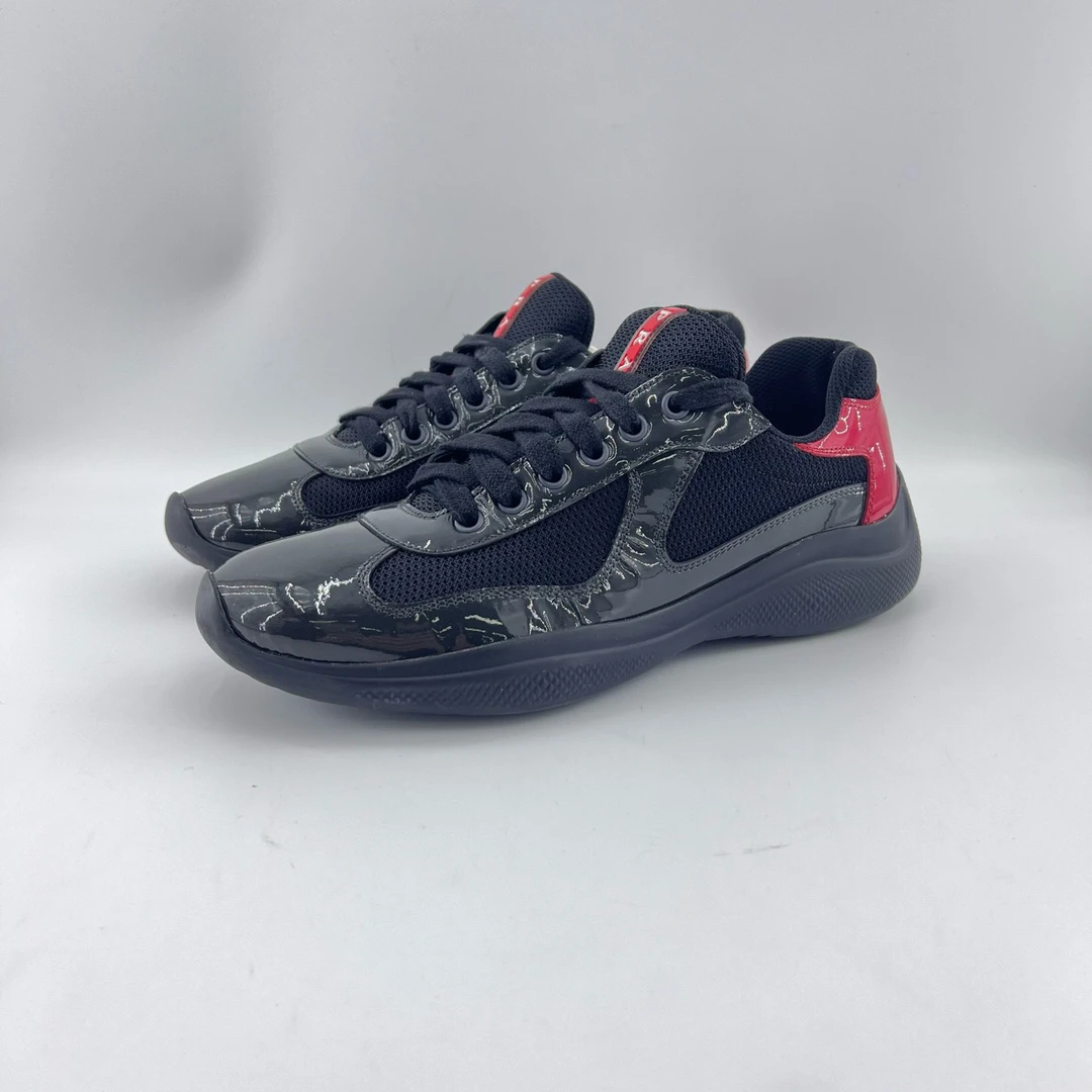 95新 Prada/普拉达 40码/黑红色双层拼接头层牛皮休闲鞋/12201549