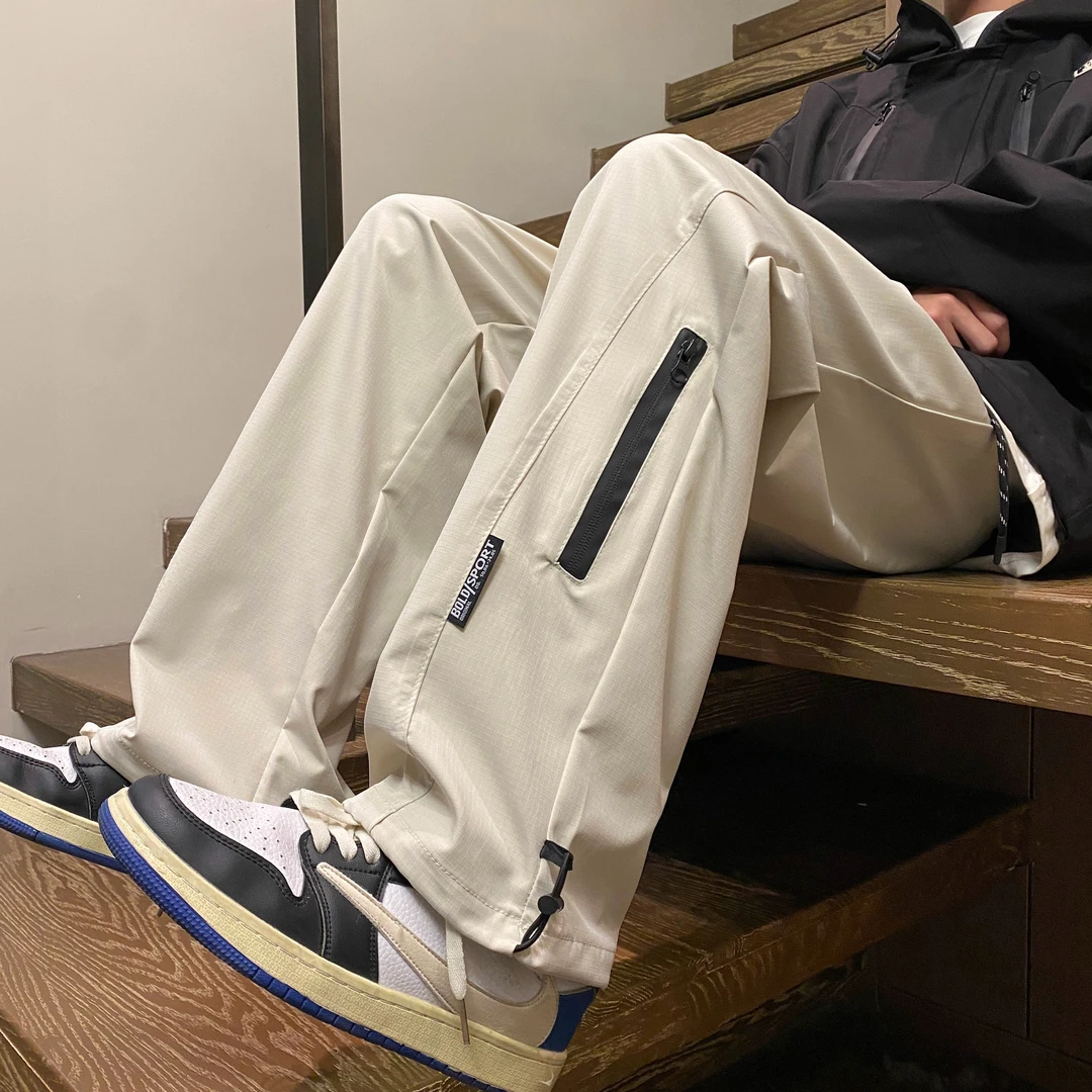 防水冲锋裤男高级感穿搭美式机能登山裤情侣三防抽绳直筒工装裤子