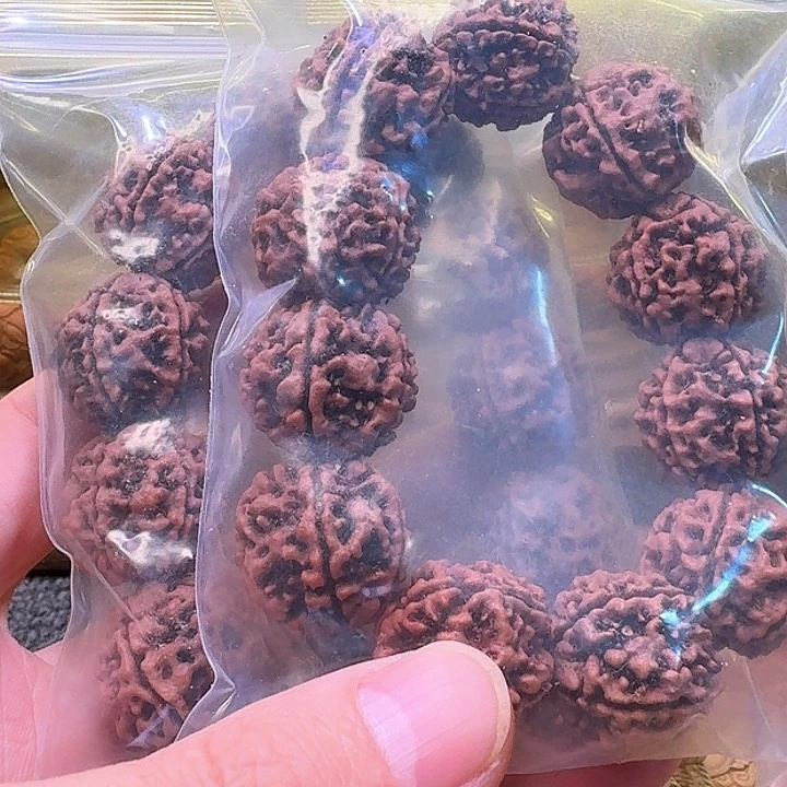 橄榄核吊坠铜**痴啦啦啦