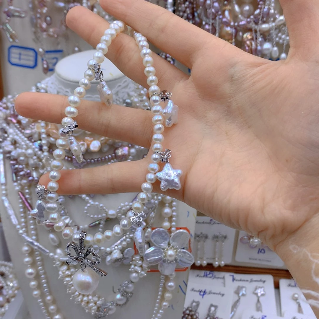 淡水珍珠耳饰银S925镶嵌紫*