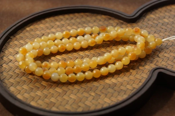 新疆和田玉黄沁卡55圆珠链子