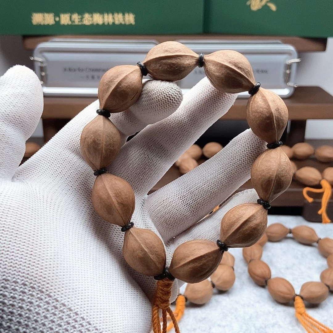 橄榄核手串壮*。1726三花小籽