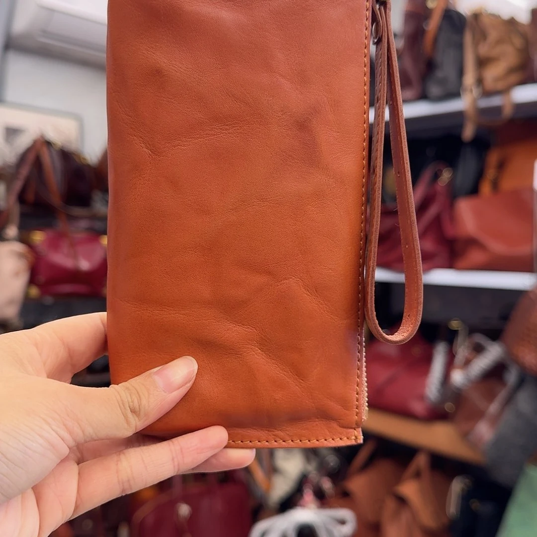 头层牛皮手拿包棕色牛皮