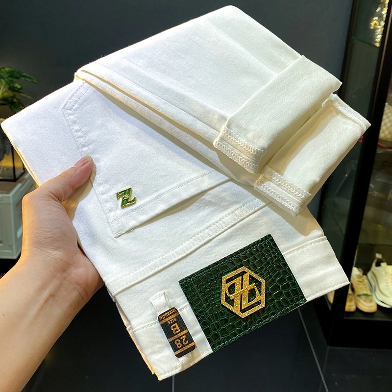 2025男士高端潮牌白色牛仔裤休闲弹力新款长裤子修身青年小脚男裤