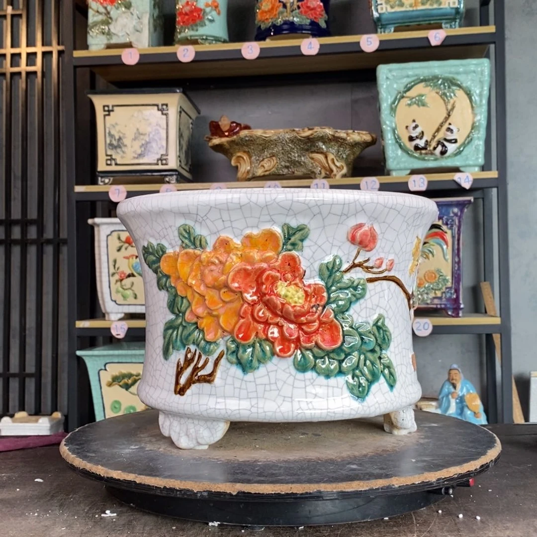 陶瓷男****己白色圆盆