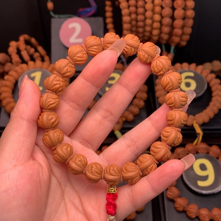 桃核吊坠1.3野生红莲手串