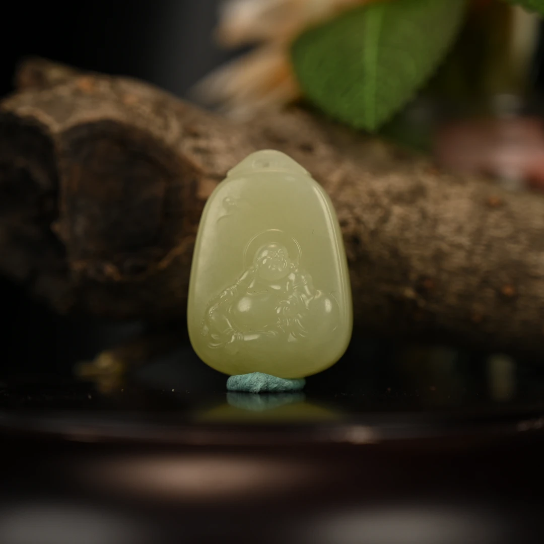 LOT8857 25YU106667 和田玉黄玉弥勒佛挂件/保利