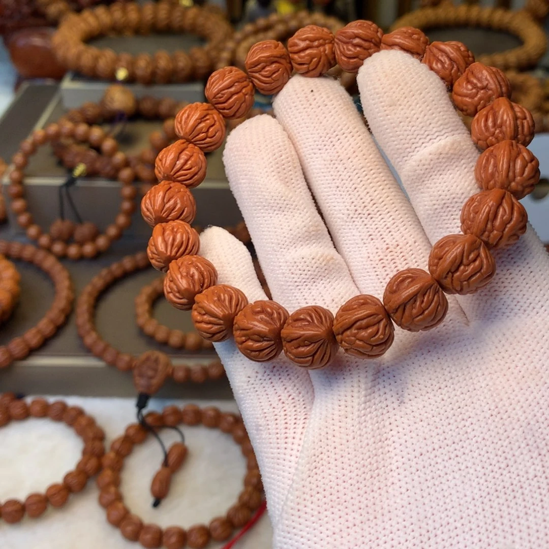 洋***哥桃核手串秦岭龙纹