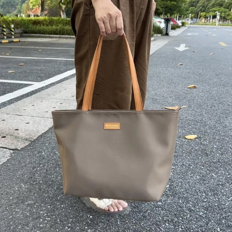 FAVMARTHA.防水牛津布托特包女学生上课通勤包手提包大容量帆布尼