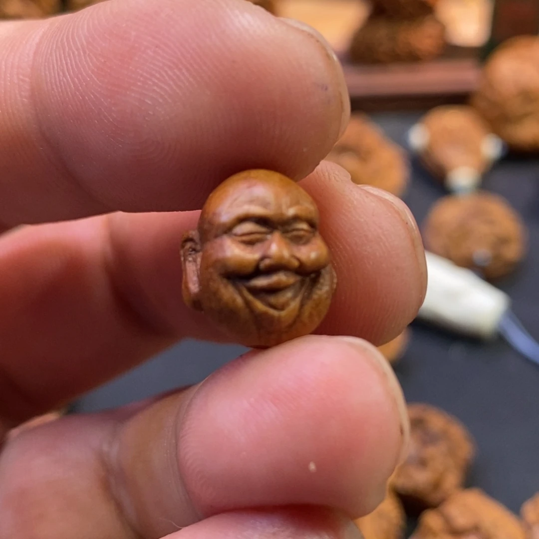 潍坊核雕桃核雕刻罗汉头