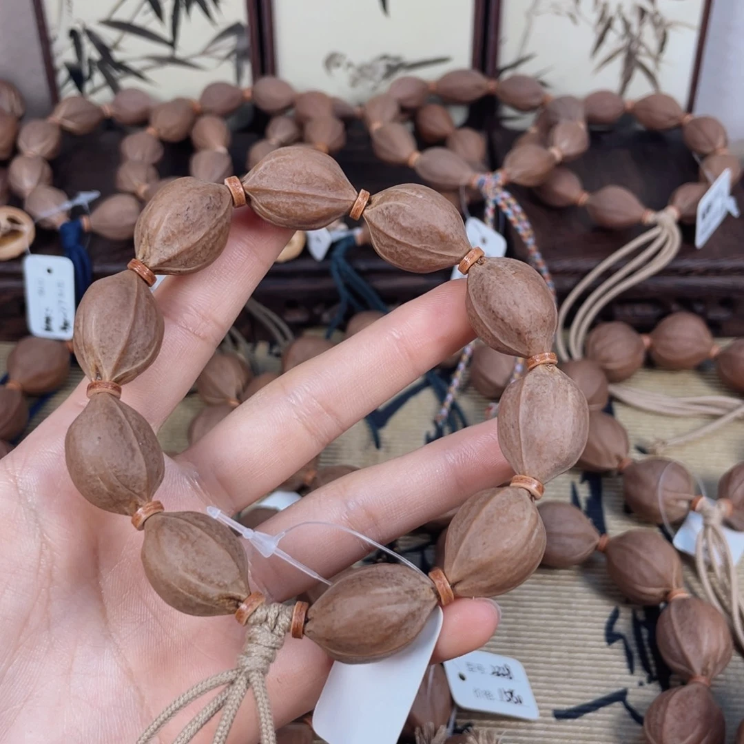 沧***粟橄榄核手串梅林铁核1724