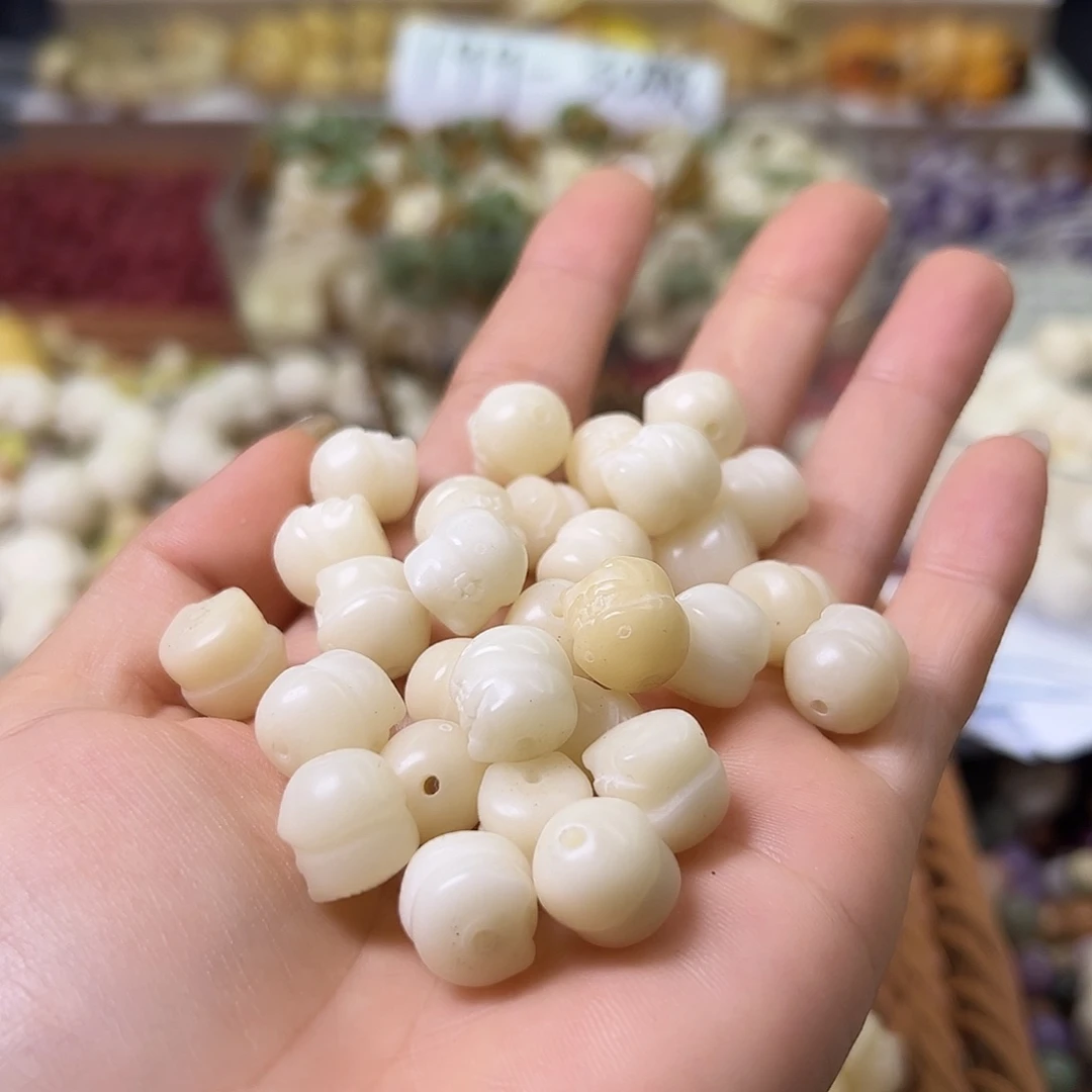 菩提根/象牙果手串微瑕丁丁50颗
