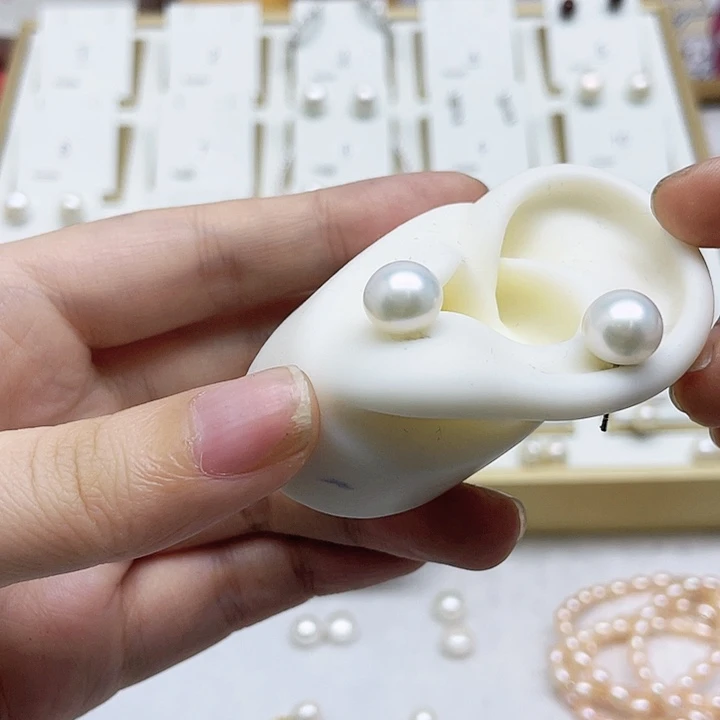 淡水珍珠耳饰银S925镶嵌只***笑