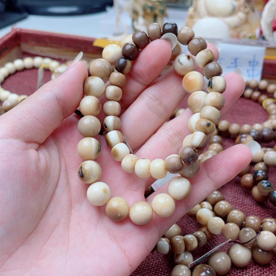 柏香籽/百香籽吊坠猛犸牙咖色手串