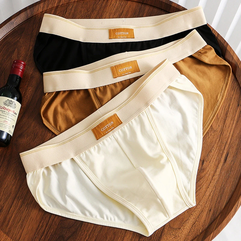 新款纯棉男士内裤宽松提臀三角裤衩简约潮男生三角裤男士内裤新款