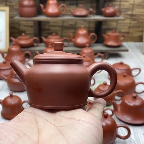 潮州朱泥手拉壶得钟壶