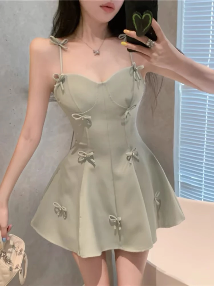 夏季茶歇风蝴蝶结性感吊带百褶短裙女收腰甜美纯欲法式绝美连衣裙
