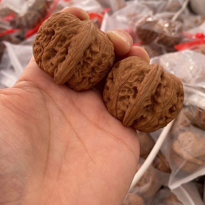 中***磊文玩核桃吊坠元宝练手对40