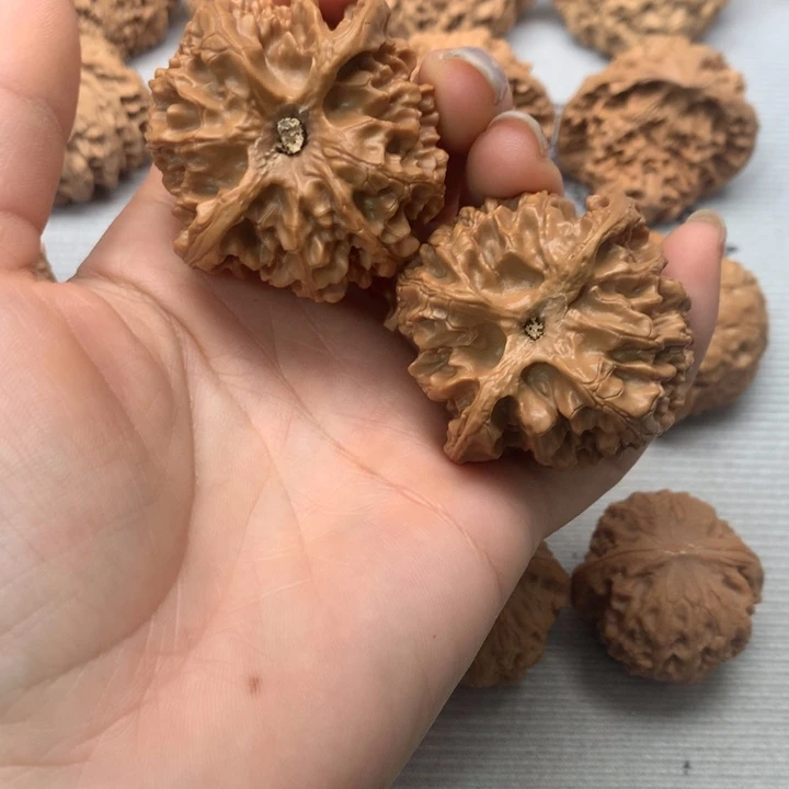 宜***郑文玩核桃把件苹果园