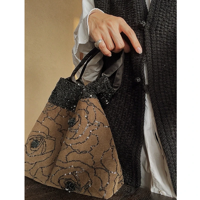 时尚潮流烫钻手提包黑色洋气设计