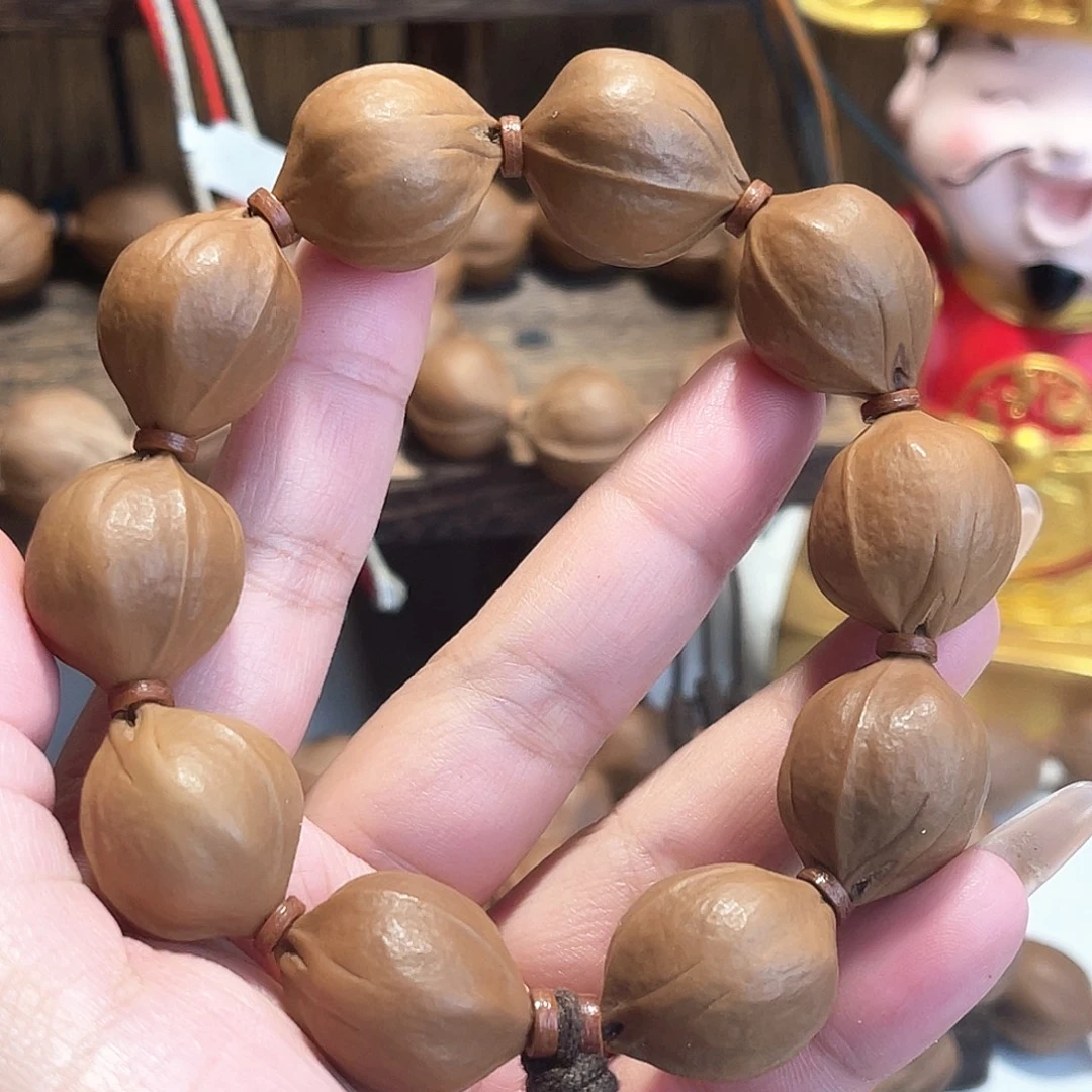 杰***.橄榄核手串/手链梅林