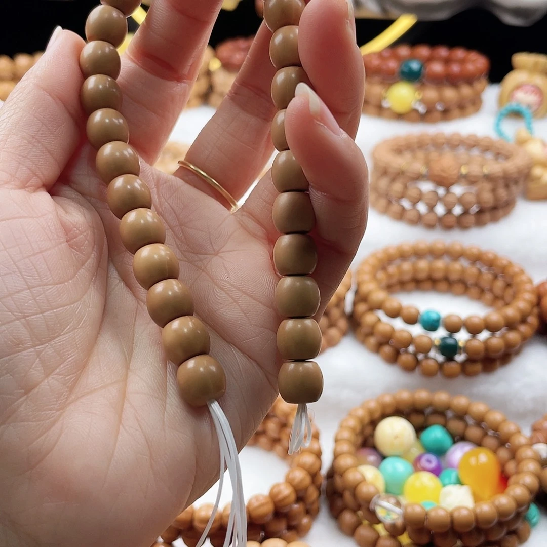 L***¥吊坠猴头核桃手串