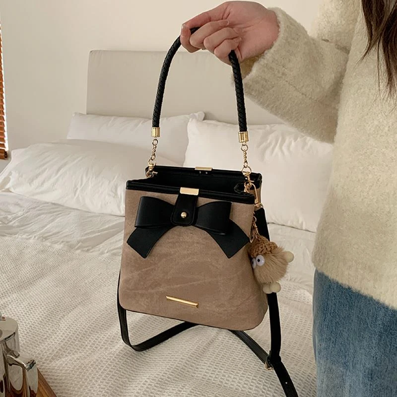 小众设计高级感蝴蝶结复古文艺手提水桶包包女休闲百搭单