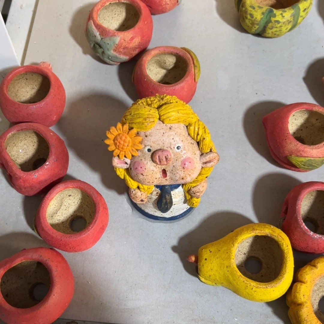 泥塑多***?古镇炻陶瑕疵