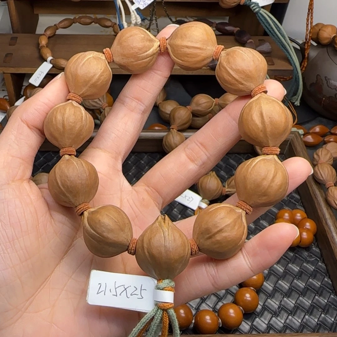 手串橄榄核08。2.15*2.5三花