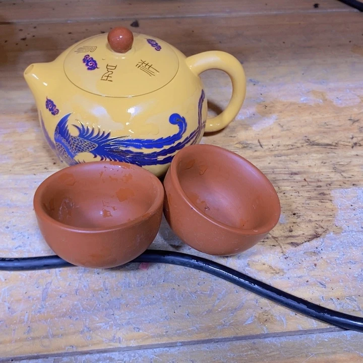 紫砂茶壶我也不知道