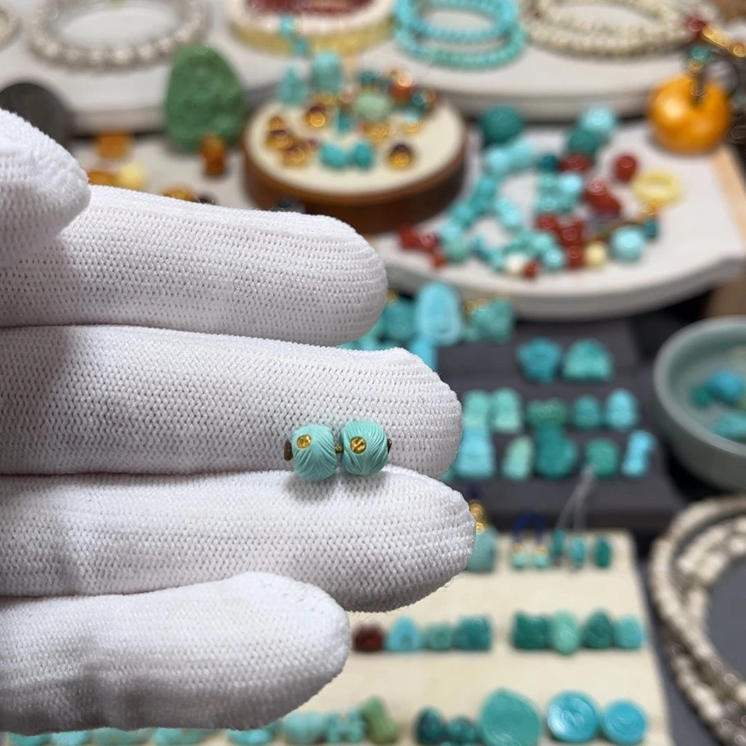 绿松石未镶嵌雕刻件羽毛对珠