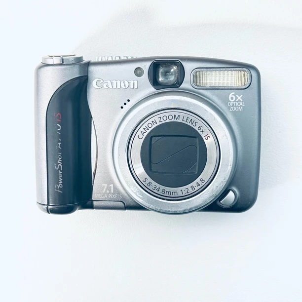 9新 Canon/佳能 a710特价800w像素6倍光变出片奶油五号电池自备