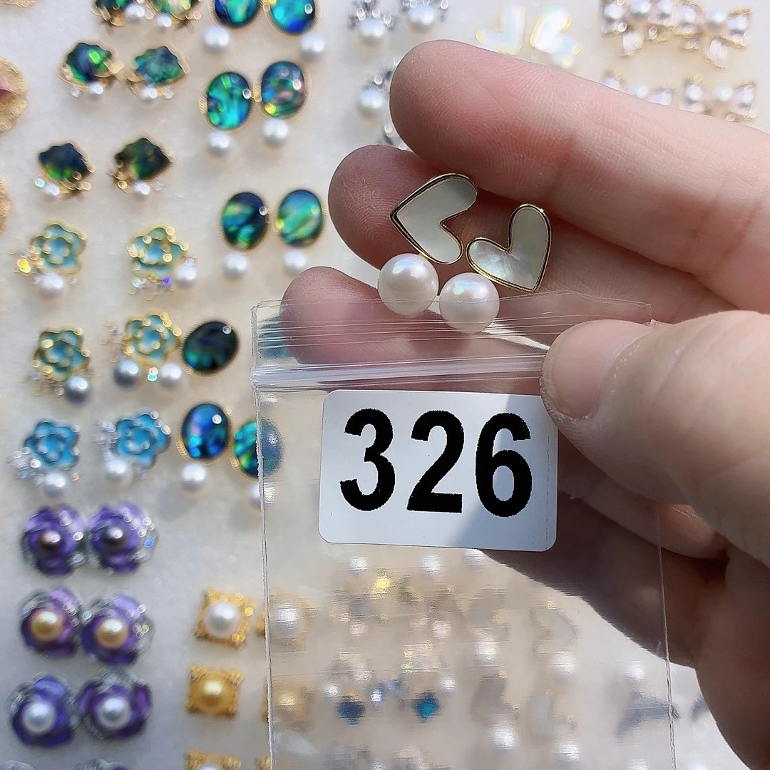 娜***～淡水珍珠合金耳饰