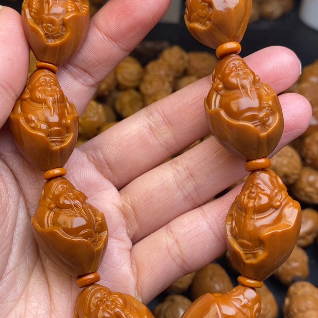 橄榄核吊坠包衣财神1.7+