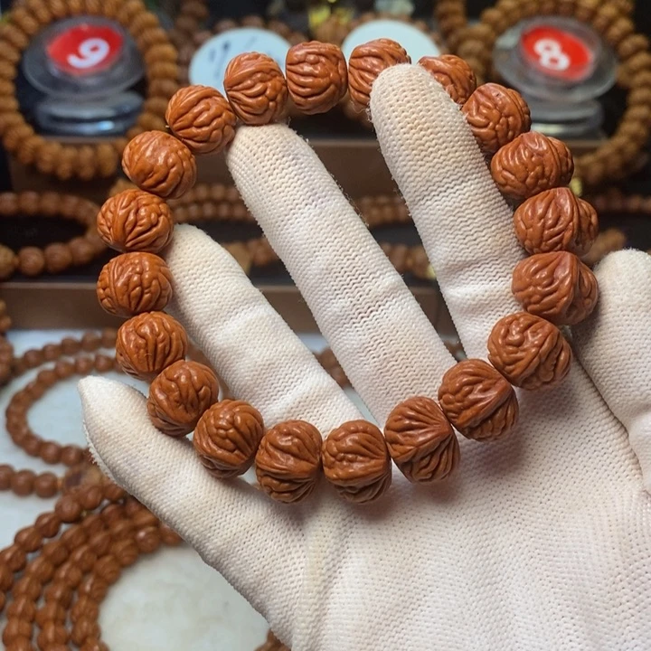 桃核手串广****笨秦岭龙纹