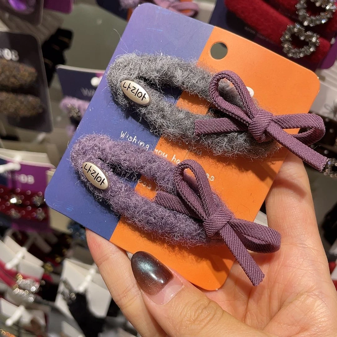 非金属灰色紫色椭圆蝴蝶结