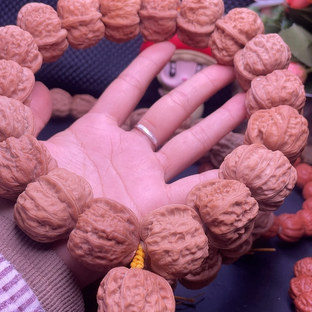 啸***5文玩核桃手串野生麻核元宝