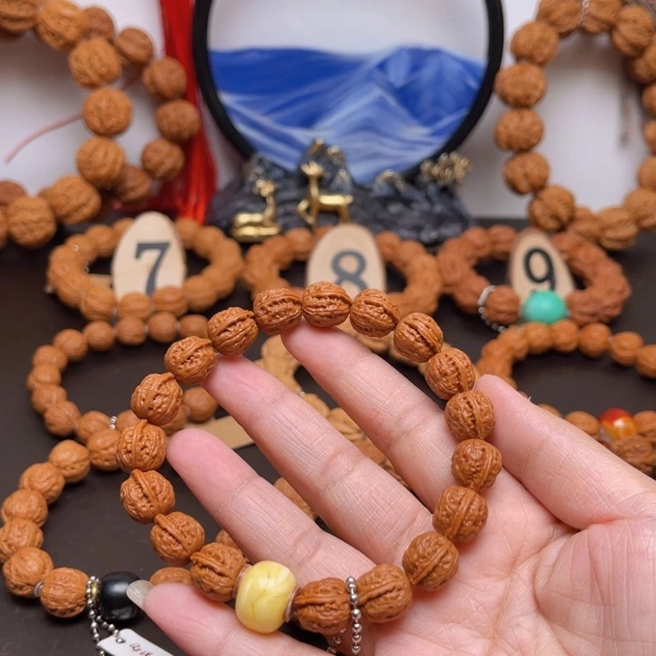 文玩核桃吊坠阿*祖核桃手串