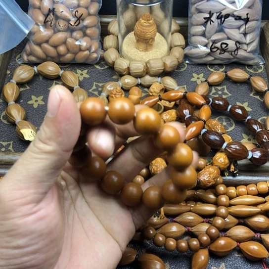 铲***生吊坠橄榄核来咯哦哦哦哟哟哟