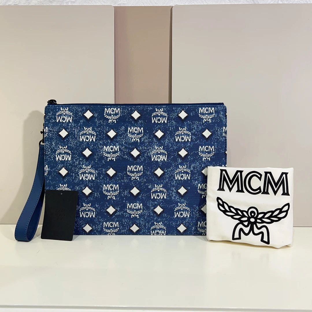 95新 MCM mcm丹宁手拿包a8133