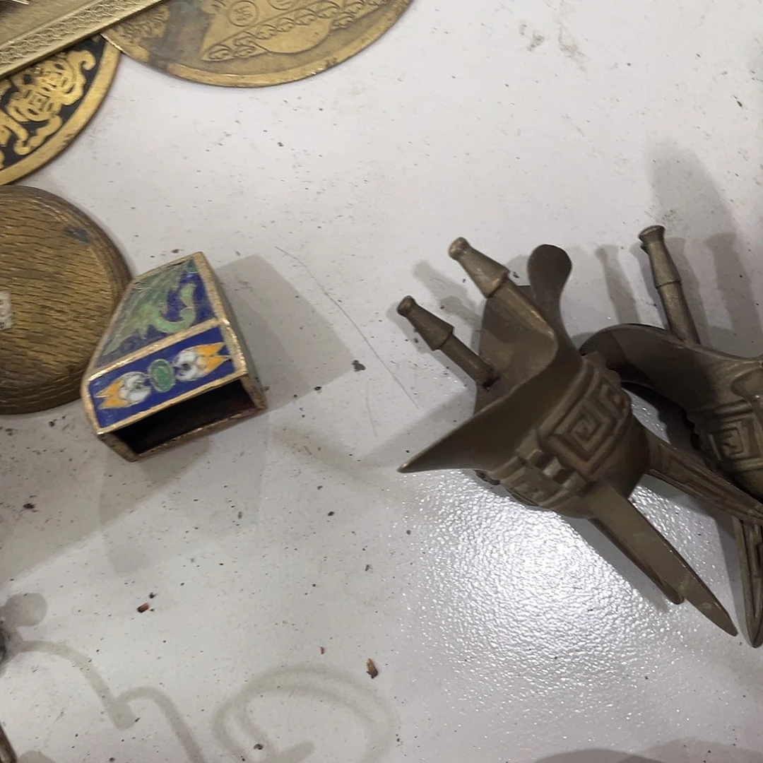 张***宝闪电购铜摆件工艺品