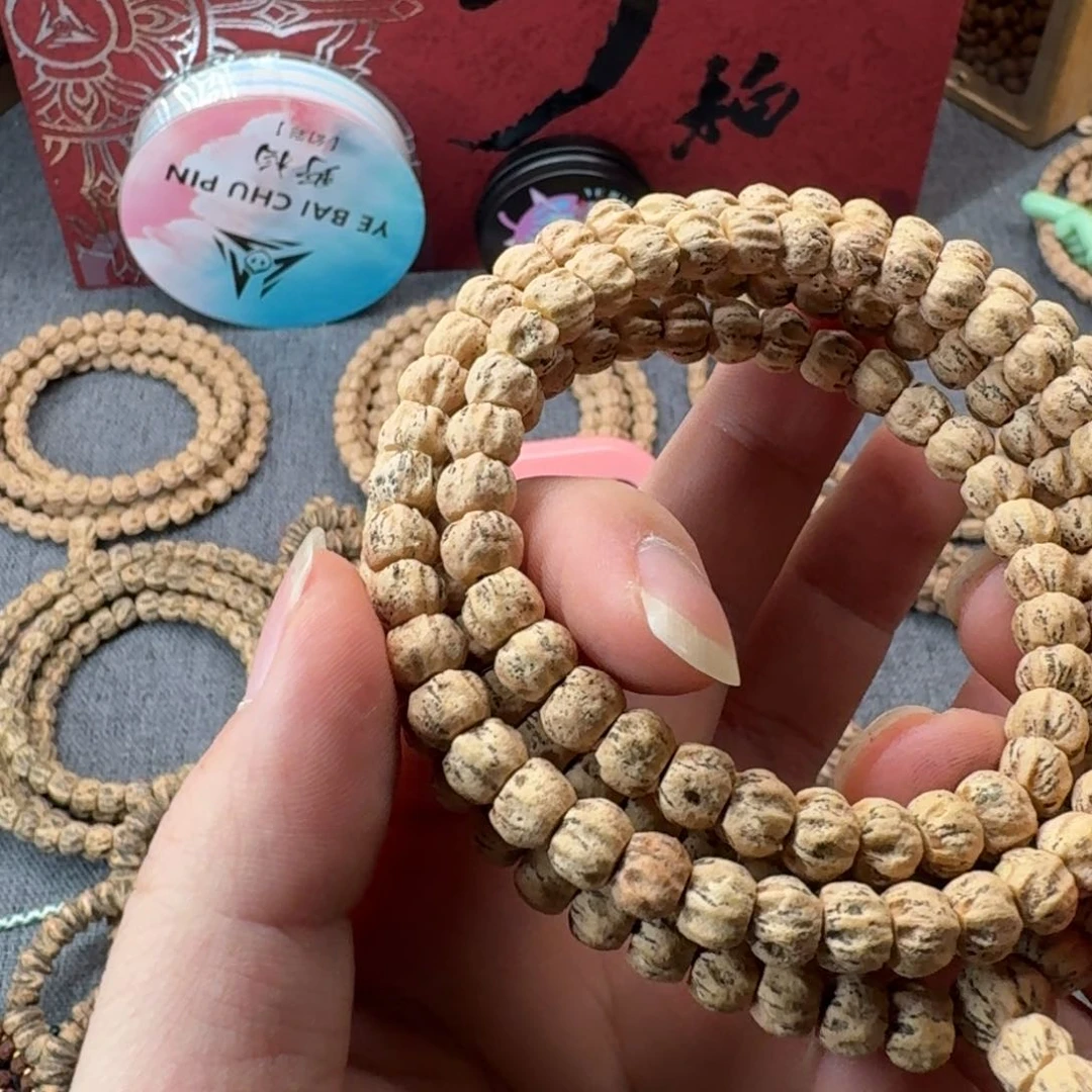 涛***油柏香籽/百香籽吊坠