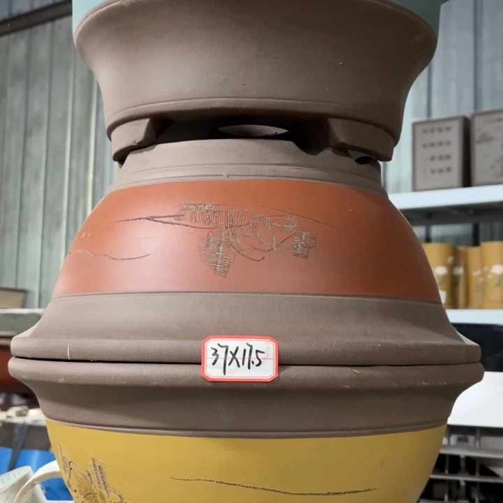 紫砂花盆100-3。