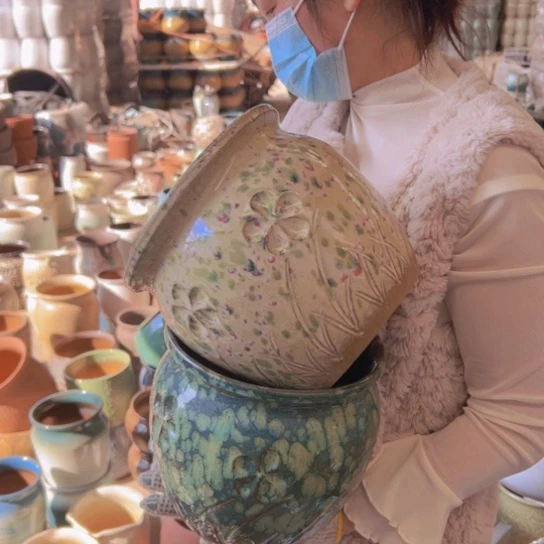 紫砂花盆高20口20。