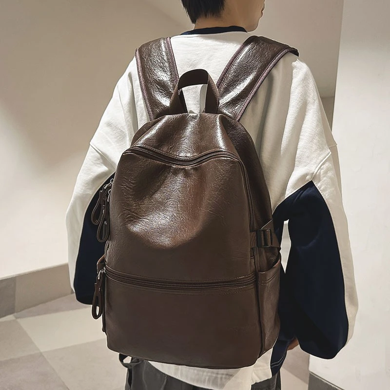 双肩包男士背包高级感皮质防水休闲通勤旅行包男高中大学生书包女