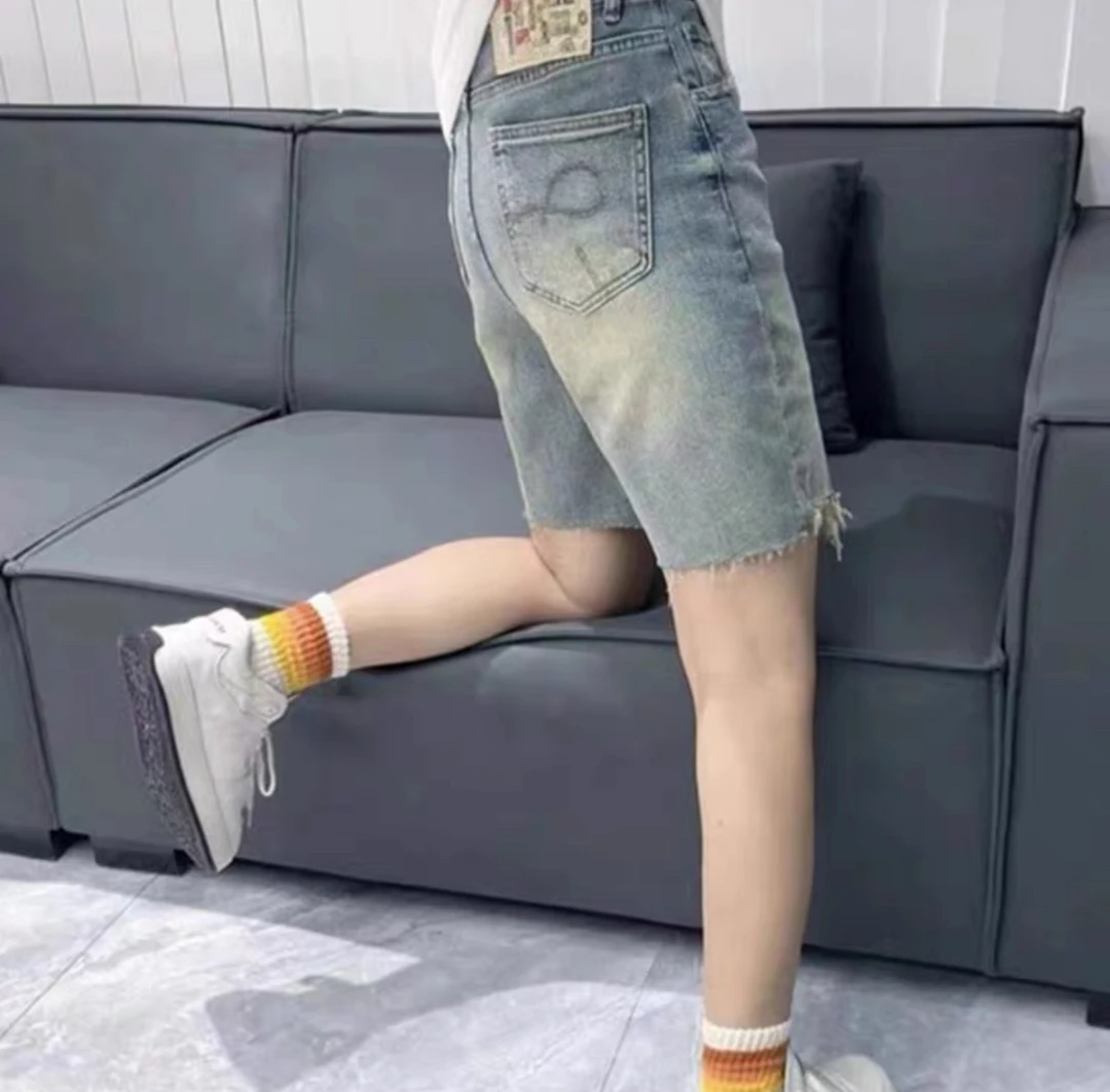 新款21858假破洞牛仔短裤